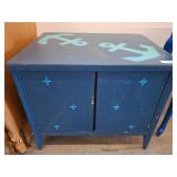 Blue Wooden Cabinet With Anchor Motif