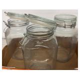 Three Glass Storage Jars with Lids