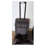 Two Geometric Pattern Rolling Luggage Bags