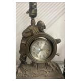 United Ship's Wheel Clock with Sailor Motif