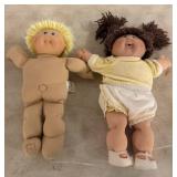 Two cabbage patch ï¿½Dolls with Yarn Hair and Fabric