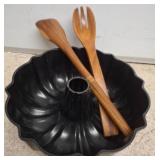 Black Bundt Pan with Wooden Salad Utensils