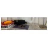 Shelf Items Including Foam Roller
