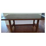 Wooden Table with Dark Top Surface