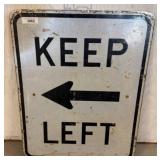Metal ï¿½Keep Leftï¿½ Road Sign With Arrow