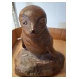 Brown Sculpted Seal on Rock Base