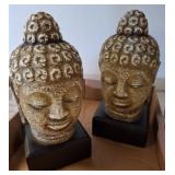 Buddha Head Sculptures on Black Bases