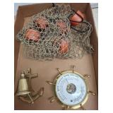 Maritime-Themed Brass Items and Net Decor
