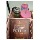 Pink Storage Bin with Bottles and Book