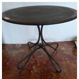 Metal Table with Round Top and Decorative Base