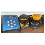 Two Electric Sanders with Surbuf Pads