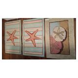 Three Rectangular Beach-Themed Rugs