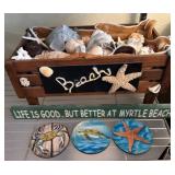 Beach-Themed Decor With Shells and Signs