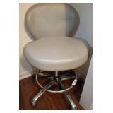 Adjustable Gray Upholstered Rolling Stool