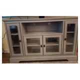 Gray Wooden Media Console With Glass Doors