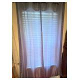 Gray Grommet Curtains and Crochet Throws