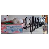 Crocheted Decor and Script CHEERS Sign