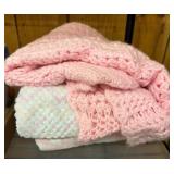 Two Pink and White Textured Throw Blankets