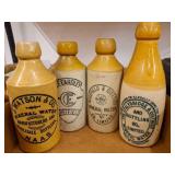Four Ceramic Mineral Water Bottles
