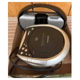 Two Portable Audio Devices by Emerson