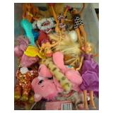 Plastic Bin with Assorted Dolls and Plush Toys