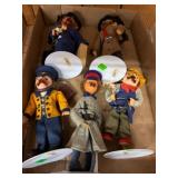 Six Decorated Fabric Dolls with Stands
