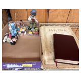 Figurines and Holy Bible