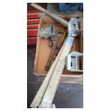 Metal Brackets, Rulers, and Pipe Wrenches