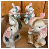 Four Ceramic Elephant Figurines