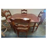 Wooden Dining Table with Four Ladder-Back Chairs