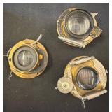 Three Brass Camera Lenses