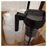 Plastic Pitcher, Cow Container, and IPA Bottles