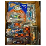Boxed Lot of NASCAR Die-Cast Cars and Accessories