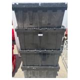 Four Black Plastic Storage Totes with Lids