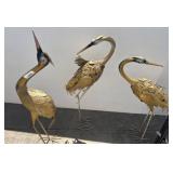 Three Metal Crane Sculptures