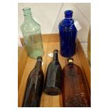 Five Colored Glass Bottles
