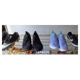 Four Pairs of Nike Shoes