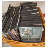 Basket of copied DVDs in Cases