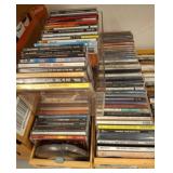 Music CDs in Plastic and Wood Holders