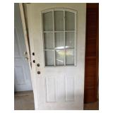 Exterior Door with Arched Glass Panel