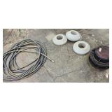 Hose, Concrete Donut Weights, and Cast Iron Cap