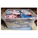 Plastic Tote With Assorted Baby Clothes