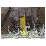 Plumbing Pipe Fittings in Wire Rack