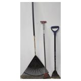 Yard Tools Trio: Rake, Hoe, and Garden Scraper