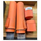 Welding Rods In Orange Protective Containers