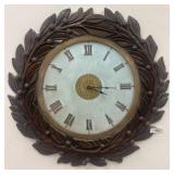 Carved Wood Wall Clock With Roman Numerals