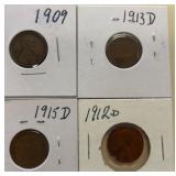 Four Wheat Pennies in Cardboard Holders
