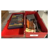 Red Bins with Drill Bits and Hand Tools