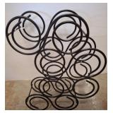 Black Metal Wine Rack with Circular Design