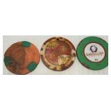 Three Casino Chips Assorted Denominations